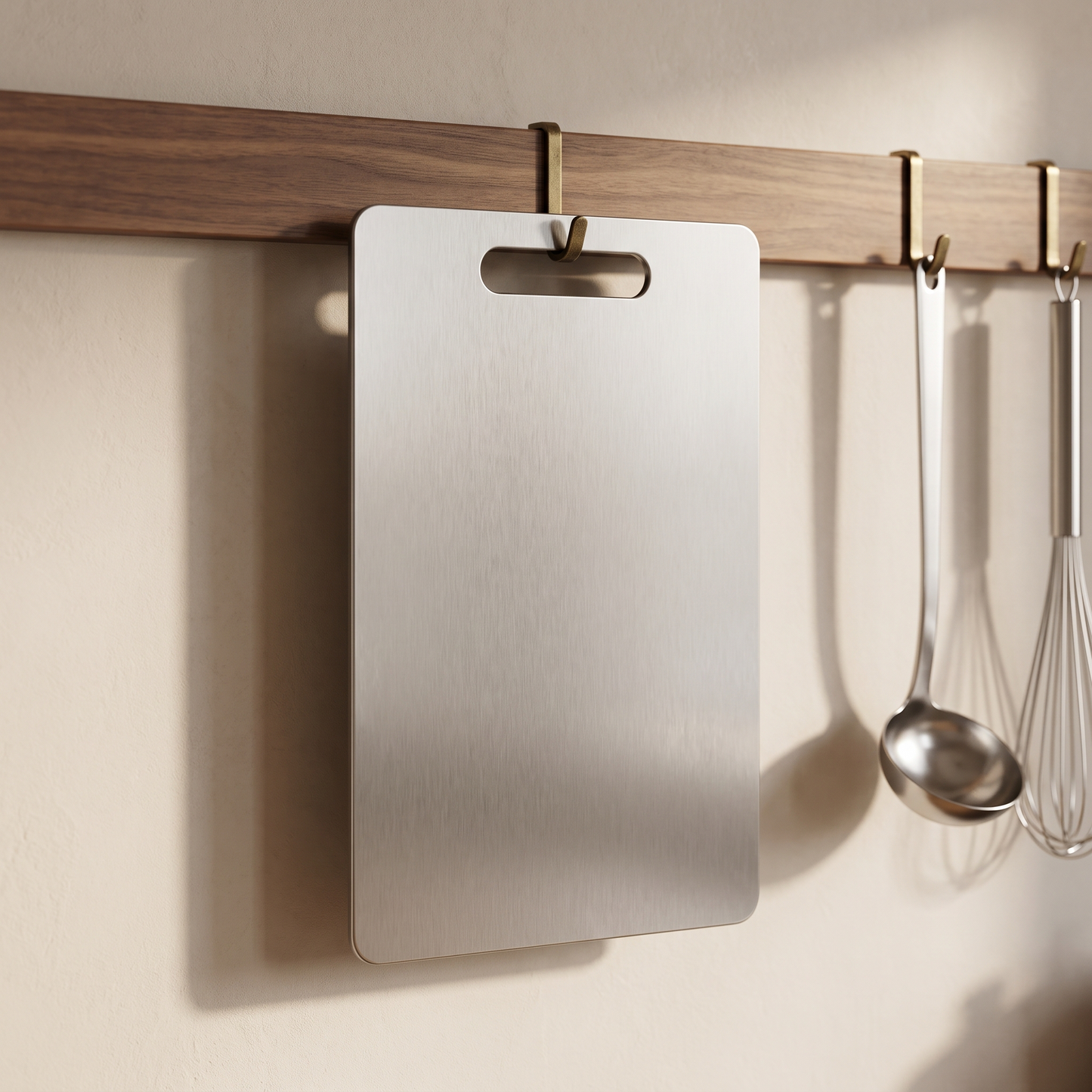 Verudia cutting board hanging from a kitchen rail