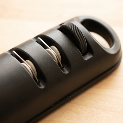 Detail of the three sharpening slots and the dial on the Verudia sharpener