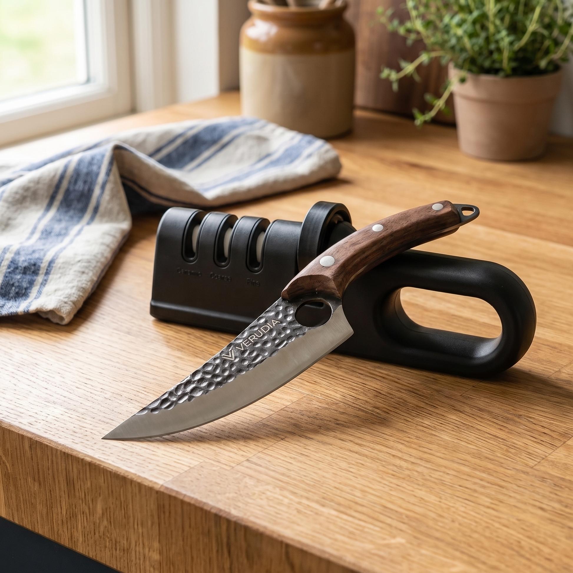 The Verudia sharpener and chef knife on a worktop